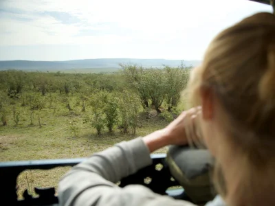 Kvinne tar bilde av gepard i Masai Mara